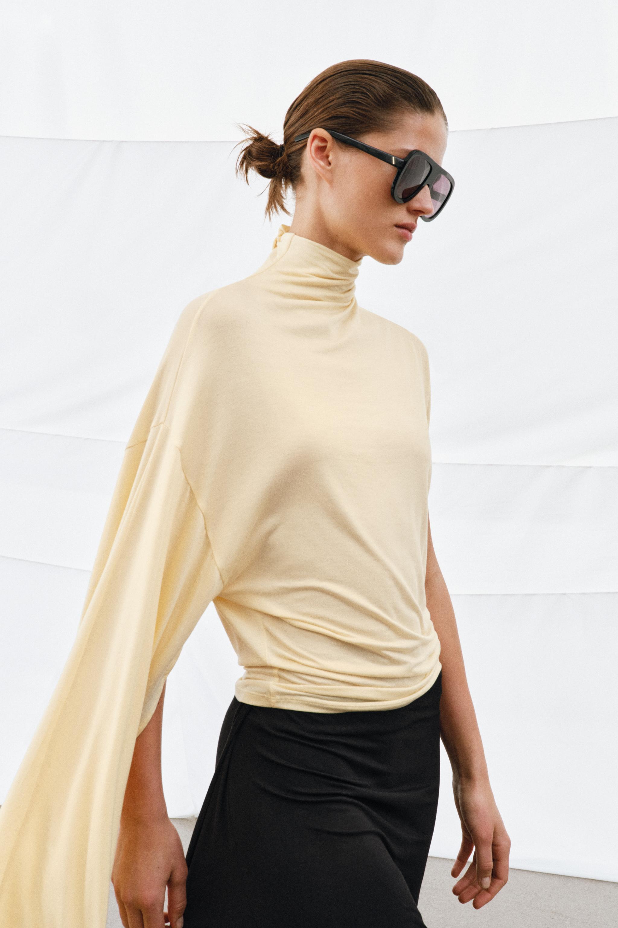 TOP FLUIDE ASYMÉTRIQUE